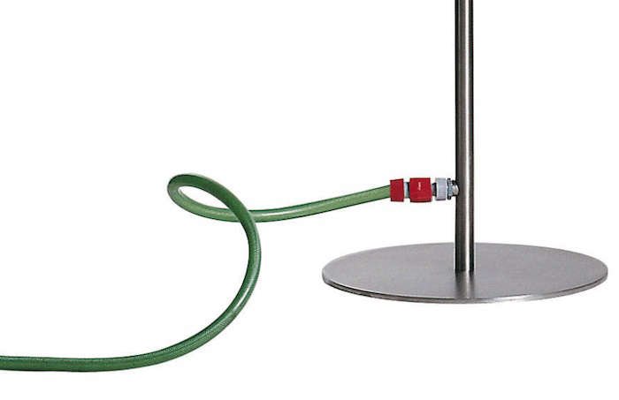  Above: An outdoor shower with a hose connection. 
